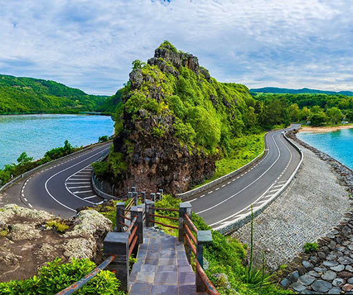 Island sightseeing tour bus on a coastal road